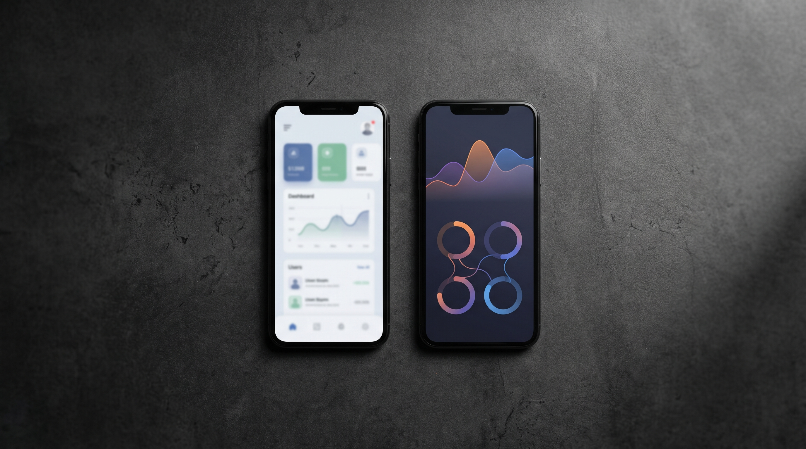 Two smartphones on a dark matte surface showing mobile app UI designs in flatlay photography